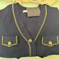 Ribbed Cardigan Adorned With Gold Chains And Gold Buttons