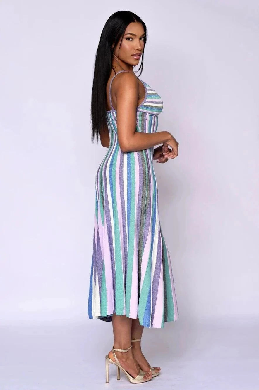 The Amara Metallic Knit Dress in multi-stripe jewel tones with spaghetti straps and a fluid midi silhouette
