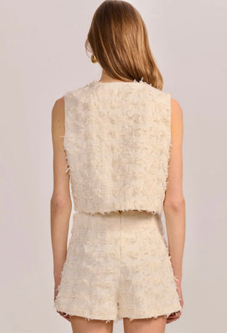 Model wearing The Gabrielle Vest in cream styled for an elegant, polished look