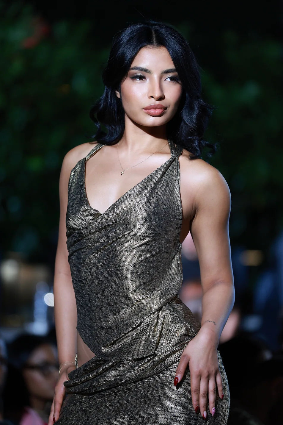 Close-up of luxe gold gown fabric and detailing