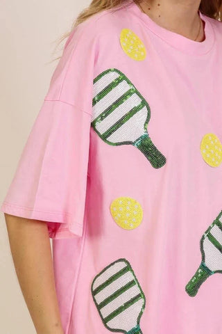 Sequin Pickleball oversized pink cotton T-shirt with sparkling paddle and ball graphics, relaxed fit
