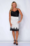 Black and white Parisian polka dot skirt with lace hem and side zip closure